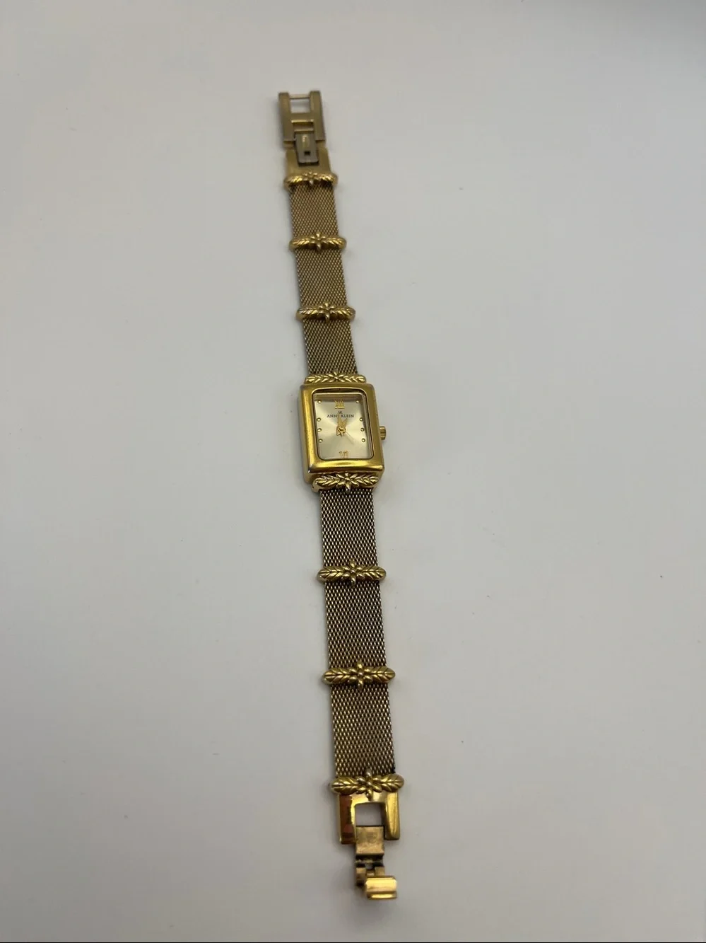 Anne Klein Women's Gold Mesh Bracelet Watch with Leaf Accents